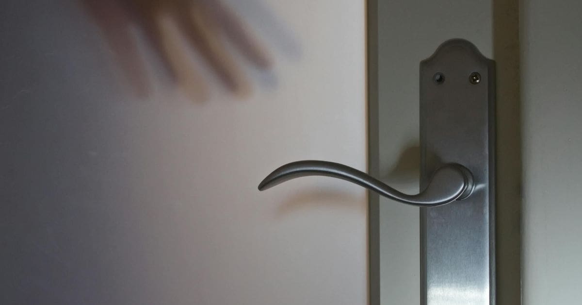 Door handle on a closed interior door representing a business that can run without the founder present